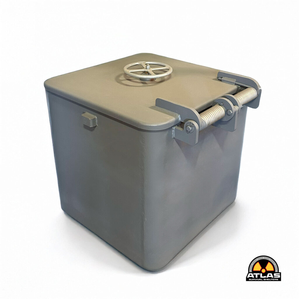Gray metal storage container with a circular wheel valve on top and an Atlas Survival Shelters logo visible at the bottom right corner.