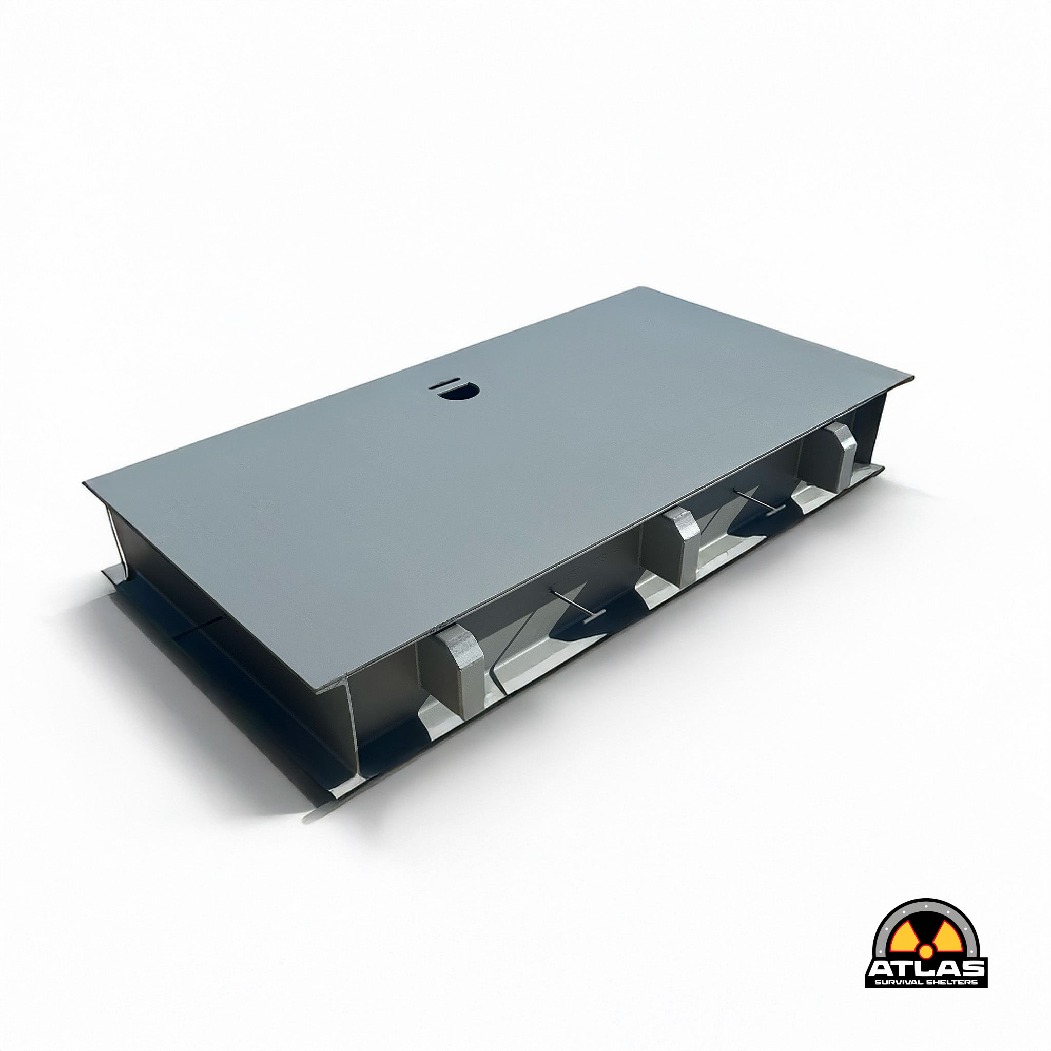 Gray angled metal shelter module with a circular vent on the top, shown with the Atlas Survival Shelters logo in the bottom-right corner.