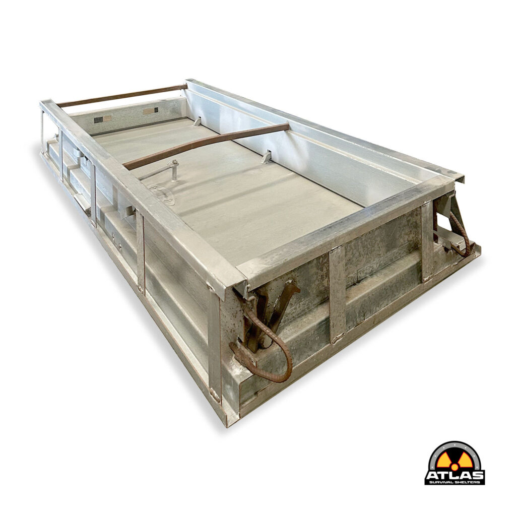 Metal emergency shelter frame with Atlas Survival Shelters logo visible in the bottom-right corner on a white background