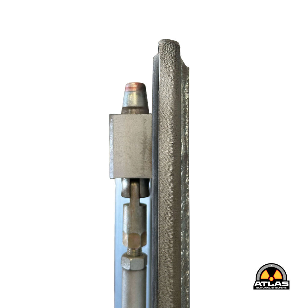 Close-up of metal rods and a bolt with textured surface, Atlas Survival Shelters logo visible in the lower right corner.